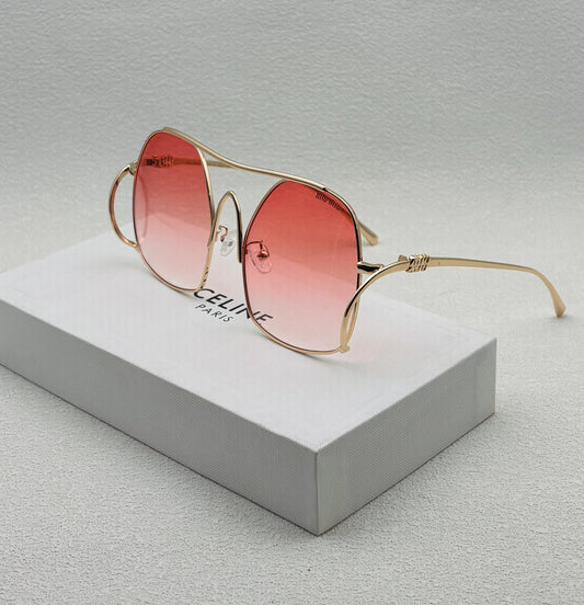 Lunettes de Soleil Oversize Ondulées – Verres Corail & Monture Dorée